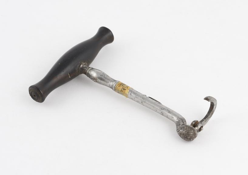 Dental key, single bend with swivelling claw, steel with ebony