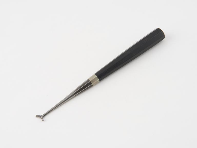 Dental plastics instrument, steel with ebony handle, English