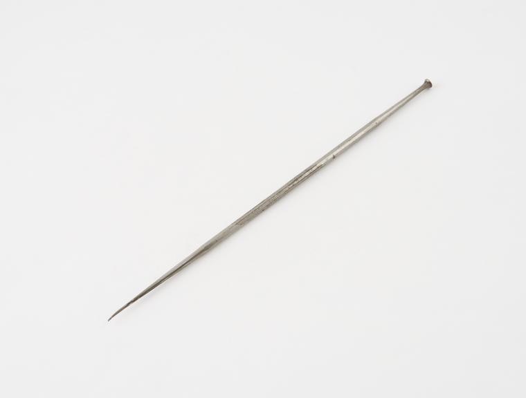 Dental gold stopper, No.11, nickel plated steel, by W. and J