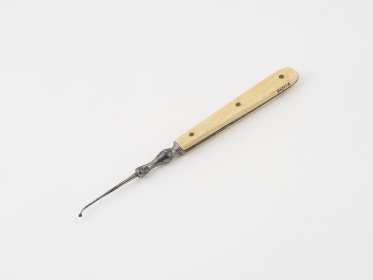 Dental burnisher, steel with rivitted ivory handle