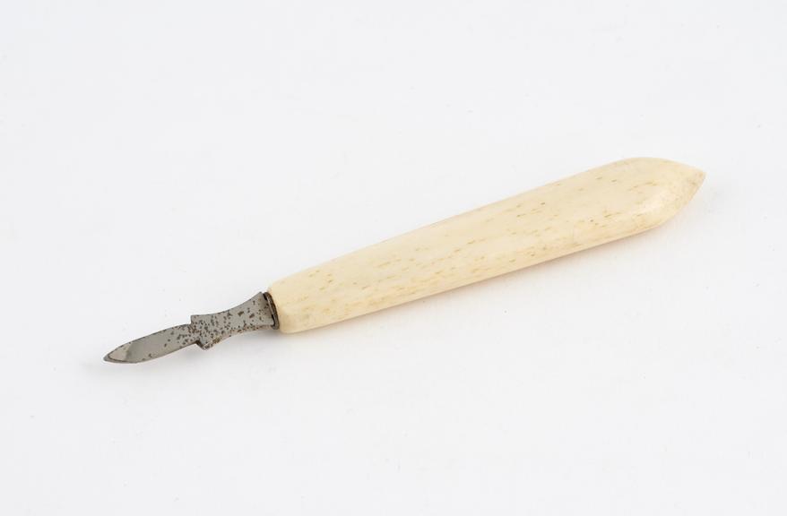 Nail scraper, steel with ivory handle, one of a set, English