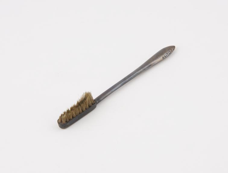 Toothbrush, silver, by I,T., Birmingham hallmark, 1814