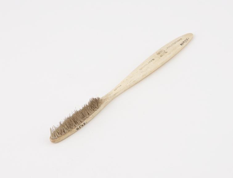 Toothbrush, bone handle, by Goodliffe, Folkestone, 1870-1910