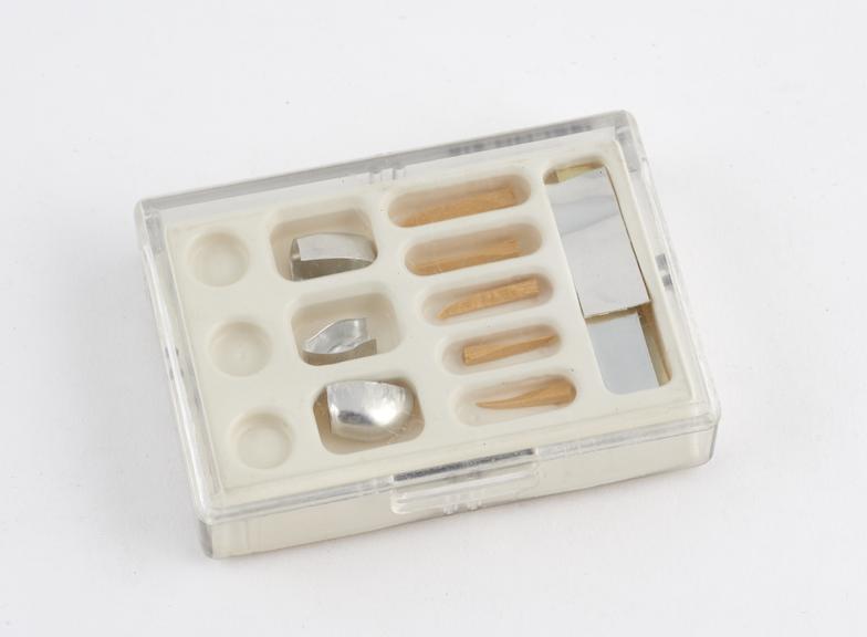 Box of crown forms, with accessories, by Hawe-Neos dental