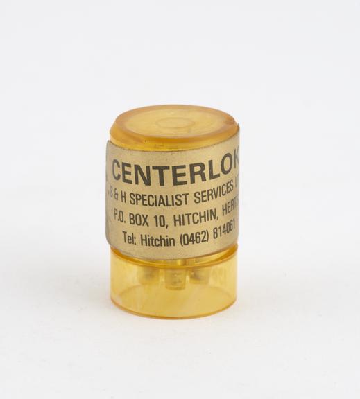 Plastic box of Centerlok' handpiece-inserted screw crown posts