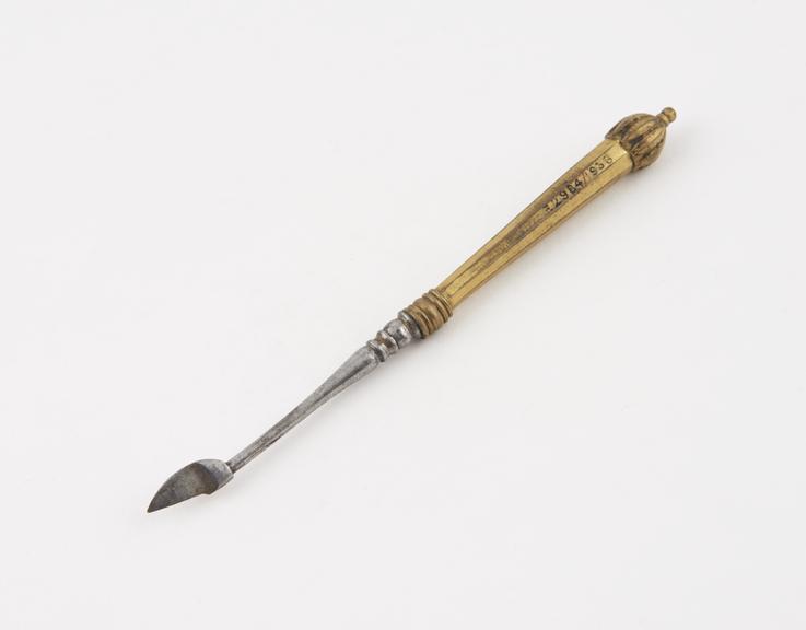 Dental scaler, steel with gilt brass handle, Italian, 1701-1820