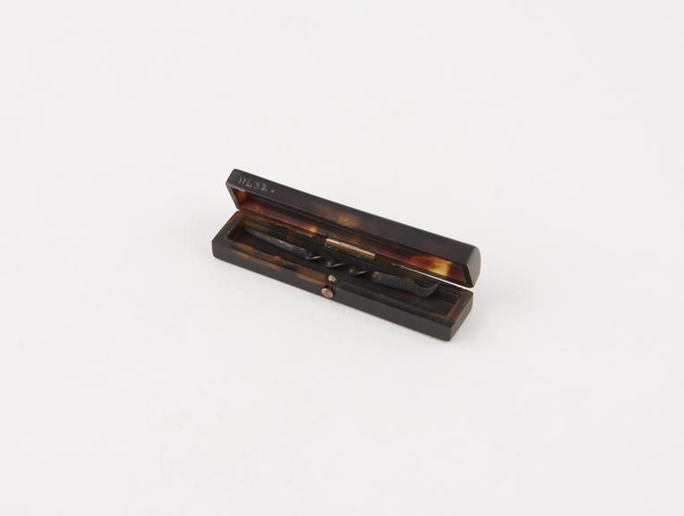 Tortoiseshell toothpick case, with a silver toothpick, English