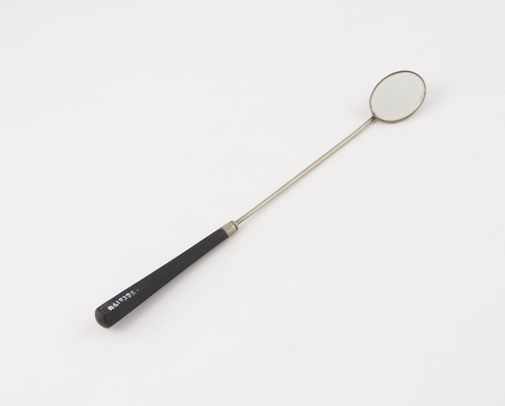 Dental mirror, ebony handle, German silver frame