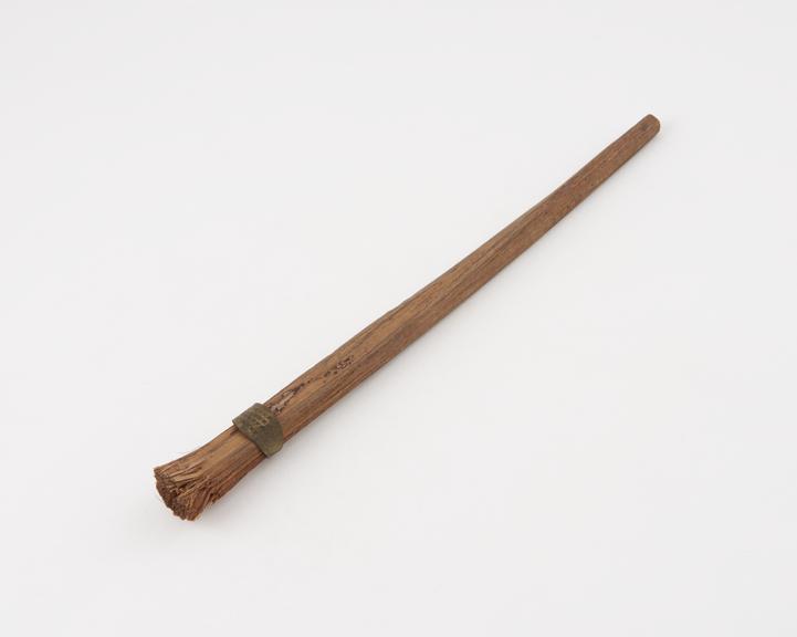 Toothbrush, frayed stick, with brass band, Indian, 1890-1934