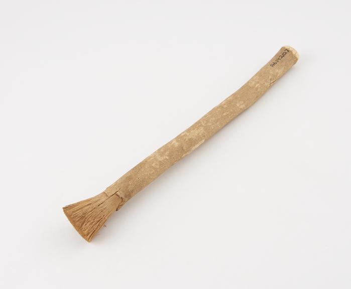 Tooth brush, frayed stick, 1890-1930