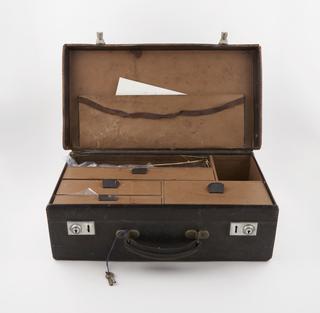 Paper bag with pill, from case for veterinary supplies, United Kingdom, 1920-1980