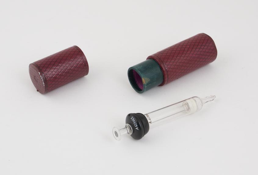 Glass piston action syringe in box