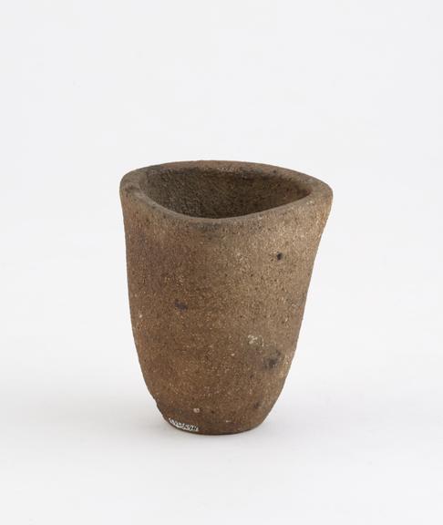 Unglazed earthenware crucible with circular base with