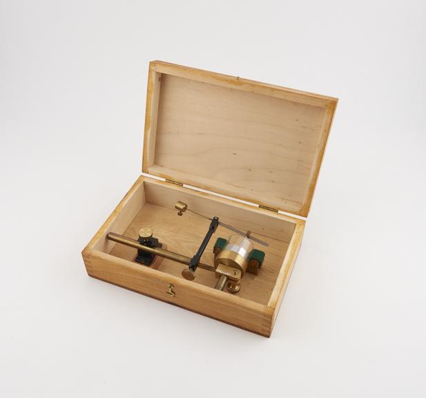 Small piston recorder in wooden box by C.F. Palmer Ltd