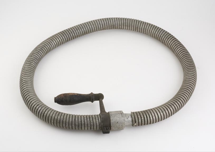 Tube, metal with wood handle, European, first half 19th century