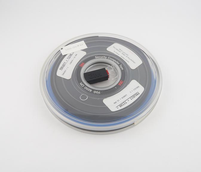 Half inch magnetic tape in canister labelled Project Titan