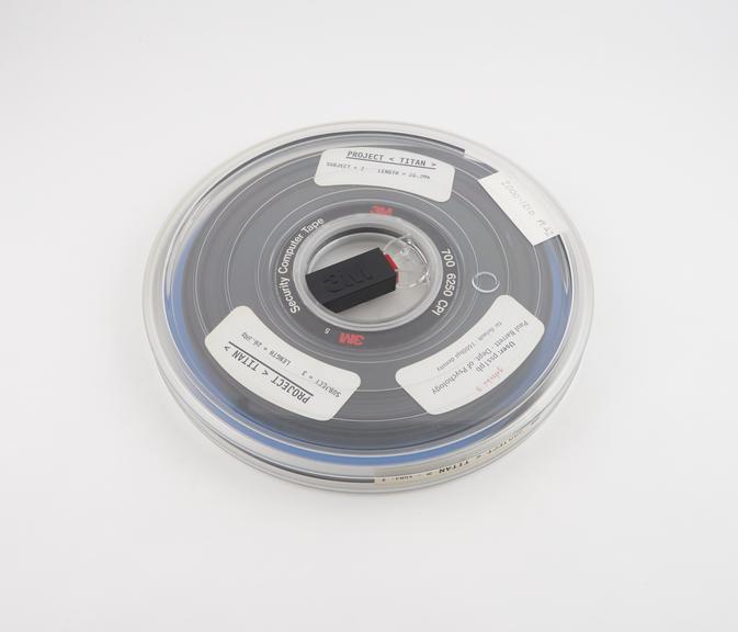 Half inch magnetic tape in canister labelled Project Titan