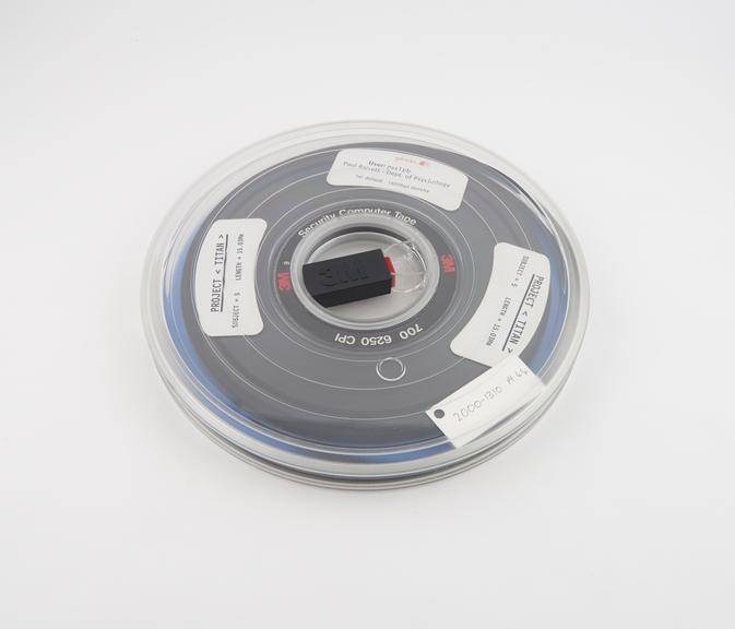 Half inch magnetic tape in canister labelled Project Titan