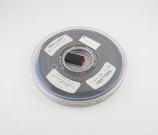 Half inch magnetic tape in canister labelled Project Titan