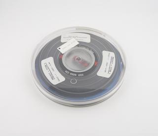 Half inch magnetic tape in canister labelled Project Titan