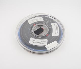 Half inch magnetic tape in canister labelled Project Titan