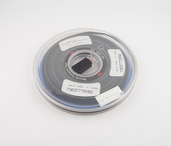 Half inch magnetic tape in canister labelled Project Titan