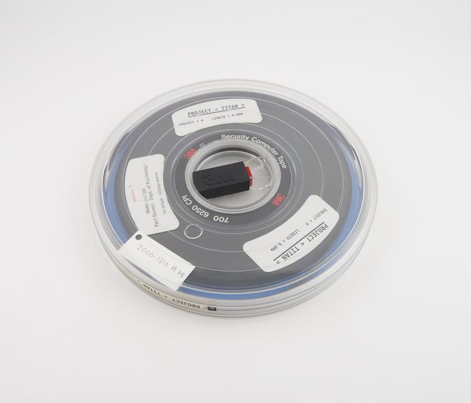 Half inch magnetic tape in canister labelled Project Titan