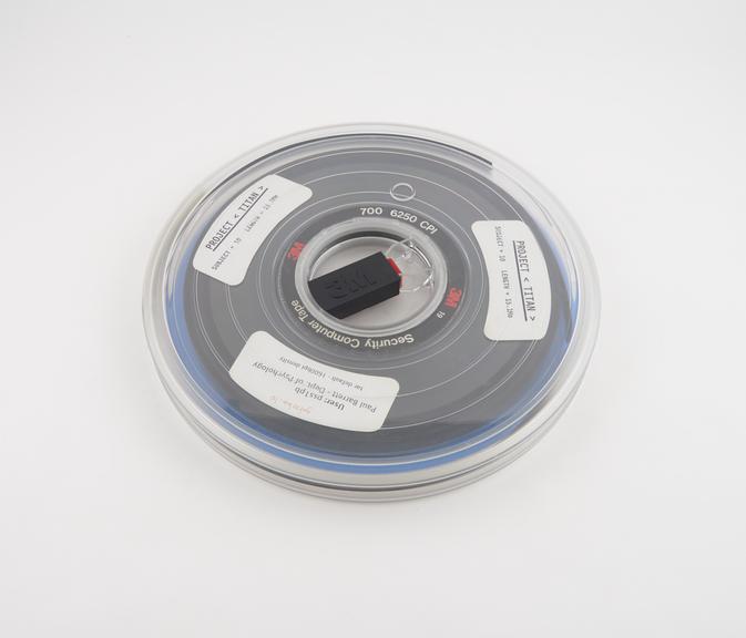 Half inch magnetic tape in canister labelled Project Titan