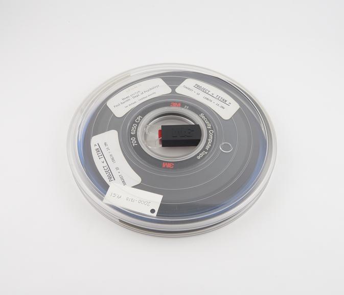 Half inch magnetic tape in canister labelled Project Titan