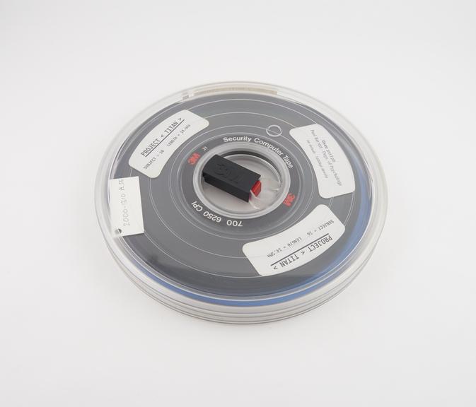 Half inch magnetic tape in canister labelled Project Titan