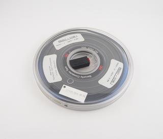 Half inch magnetic tape in canister labelled Project Titan