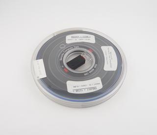 Half inch magnetic tape in canister labelled Project Titan