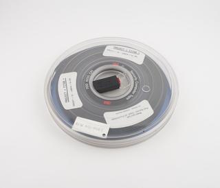 Half inch magnetic tape in canister labelled Project Titan