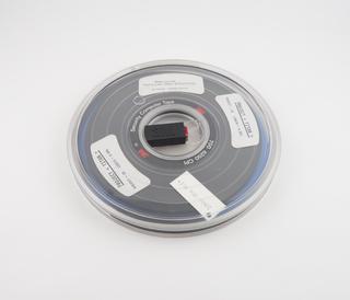 Half inch magnetic tape in canister labelled Project Titan