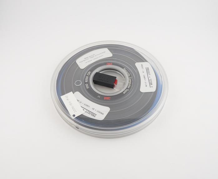 Half inch magnetic tape in canister, subject 26; length 37