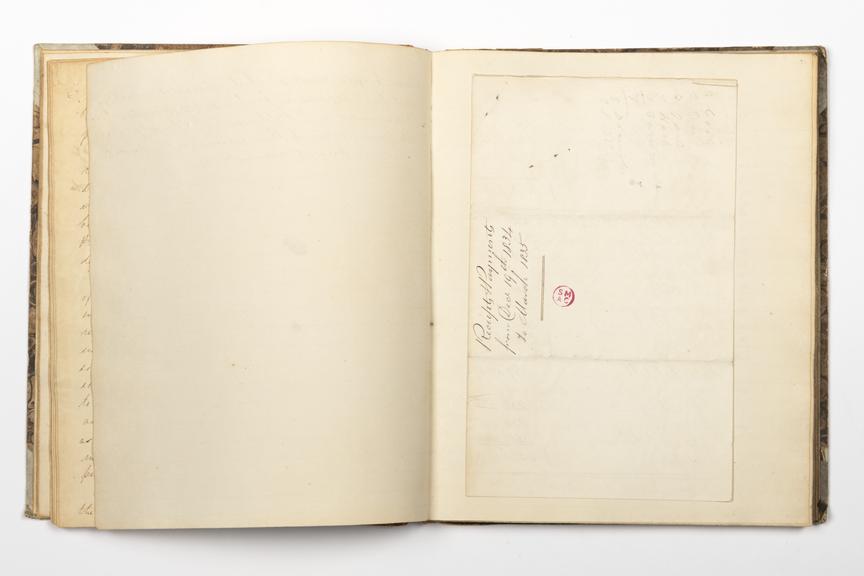 Pages 40 and 41 of the Robert Stephenson & Co Ltd minute book no.1 showing reverse of inserted receipt document