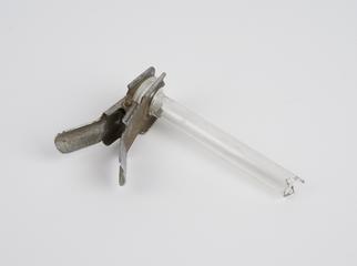 Glass tube with half-sphere on one end with a clamp attached