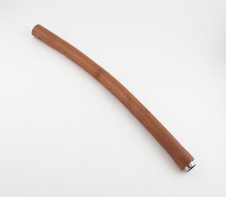 Piece of rubber tubing with metal connecting piece at the end