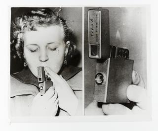 Photograph of a woman using a camera lighter