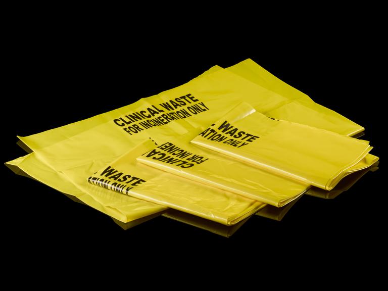 Yellow plastic clinical waste bags