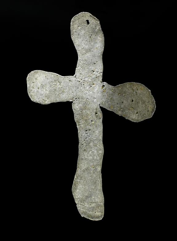 Crudely executed cross of lead