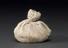 Small muslin bag containing amuletic bread