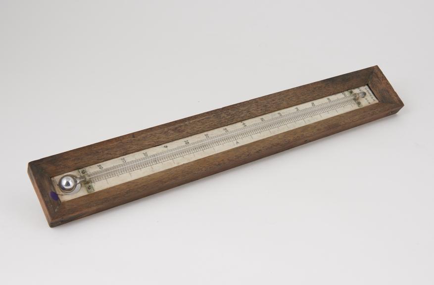 Ordinary mercury-in-glass thermometer with ivory s