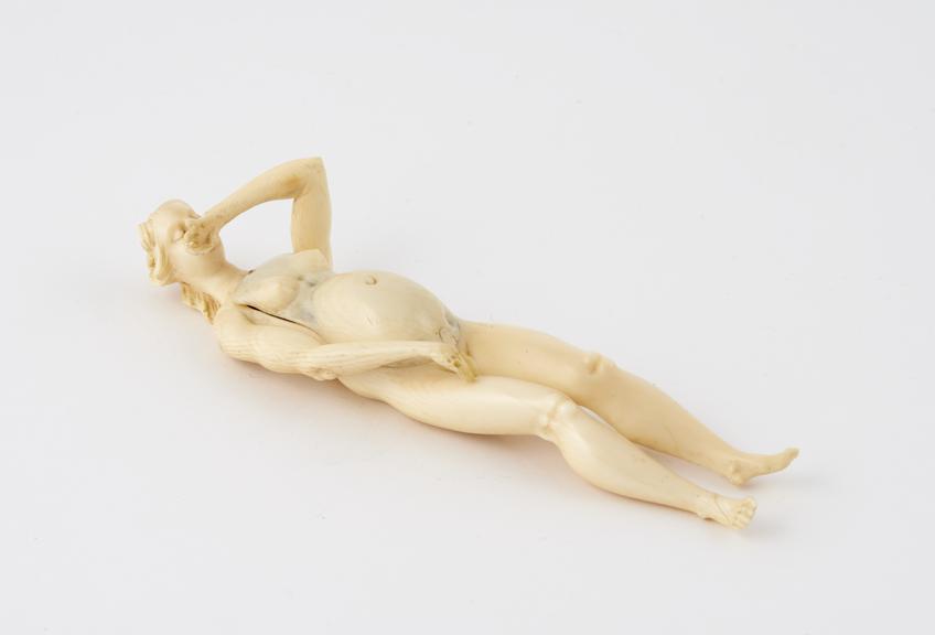 Ivory anatomical figure, a pregnant female with so