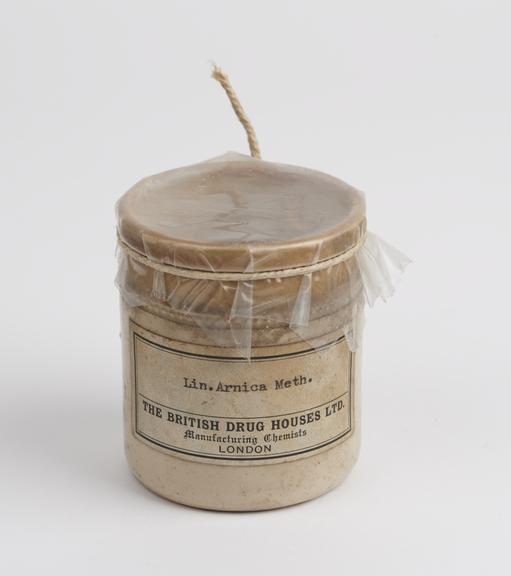 Arnica liniment dispensing pot