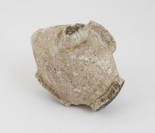 Horse calculus, oval in shape with varuous lumps protruding from it