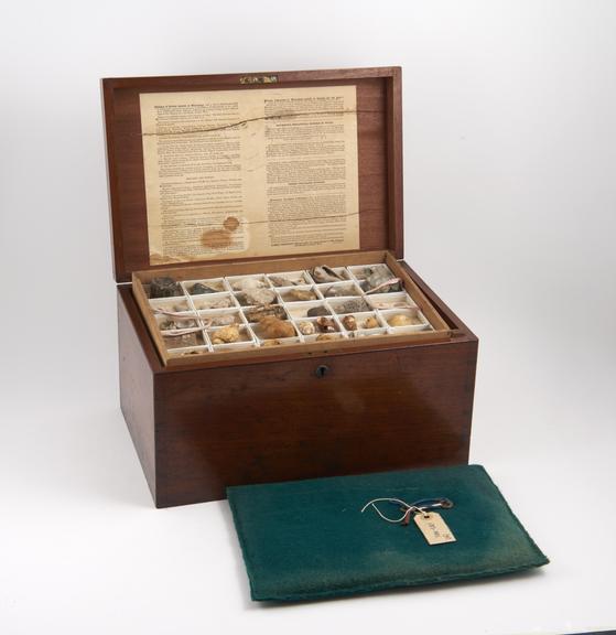 Elementary geological collection of approximately 200 specimens contained in a mahogany cabinet fitted with five trays