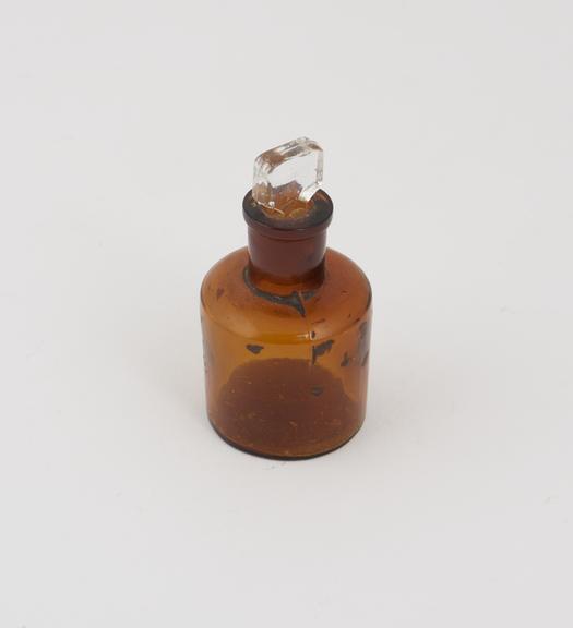 Small brown glass reagent bottle, with glass stopper, 1900-1