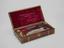 Set of surgical instruments in walnut case, by Savigny