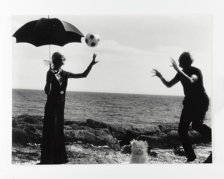 Photographic print of Clare and Kerry throwing a football back and forth